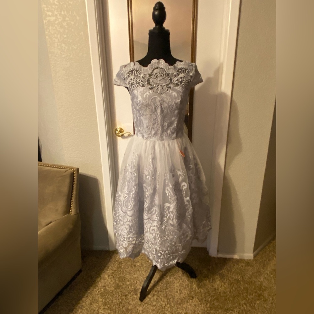 Chi Chi London. Silver lace party dress. NWT.